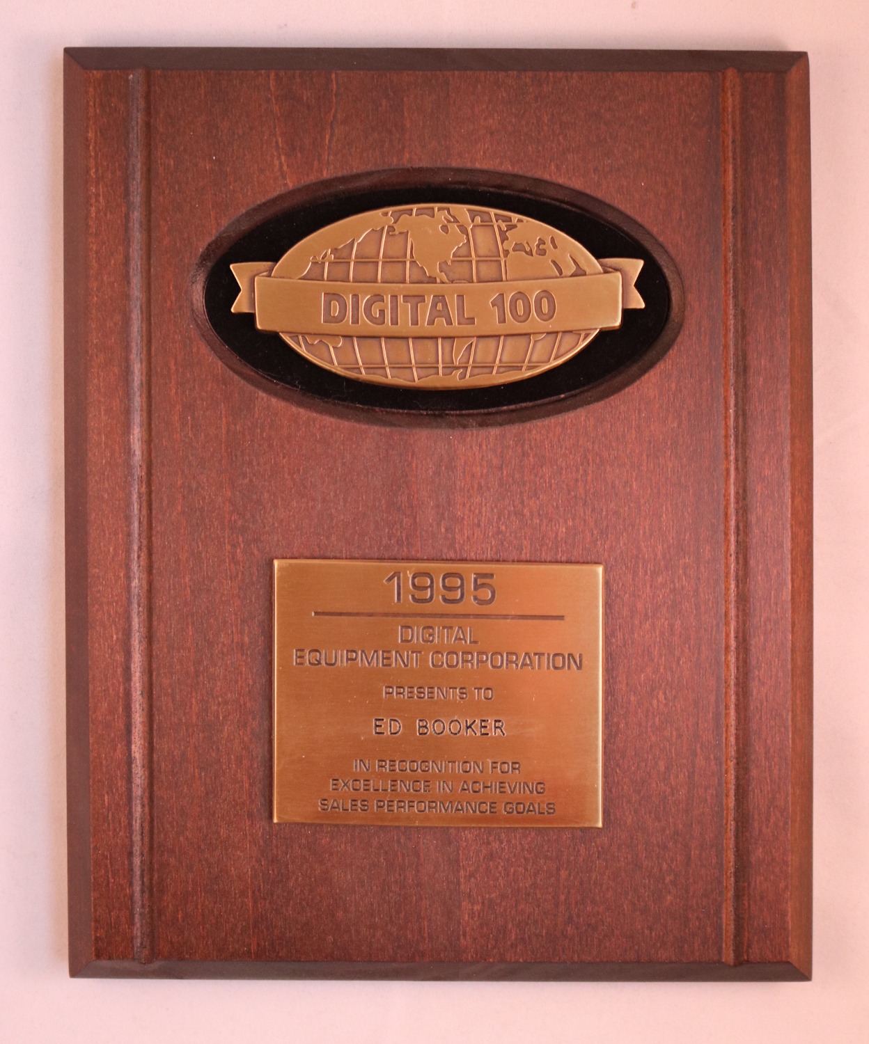 wooden rectangular plaque with gold insets