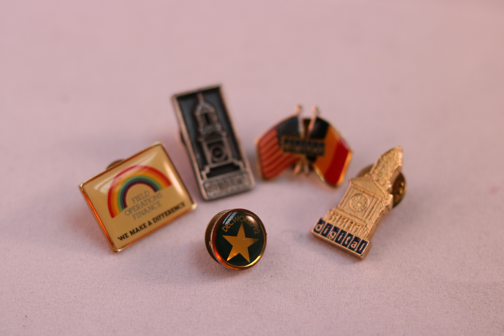 small metal badges