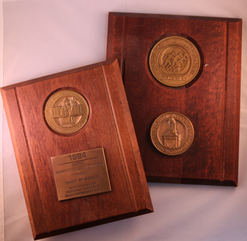 wooden rectangular plaques with golden metal inlay
